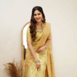 Yellow woven banarasi silk saree with blouse